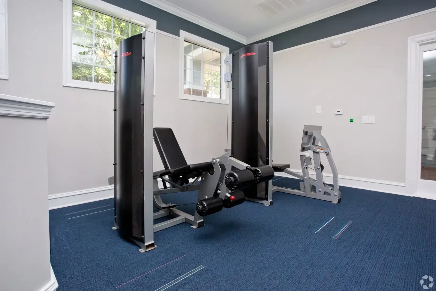 Strength training equipment in the fitness center at Overlook Ridge Apartments