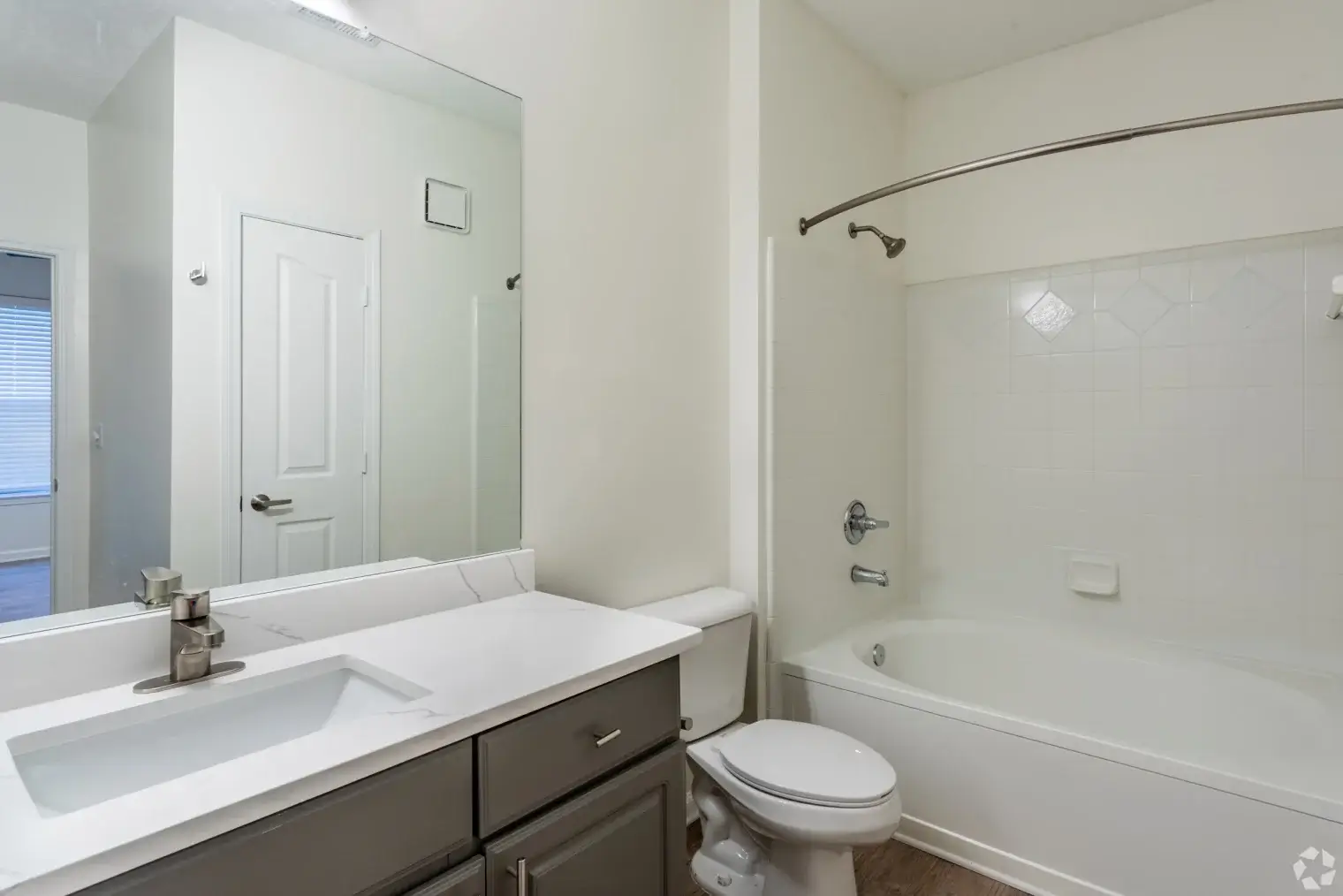 Modern apartment bathroom with bathtub at Overlook Ridge in Atlanta GA